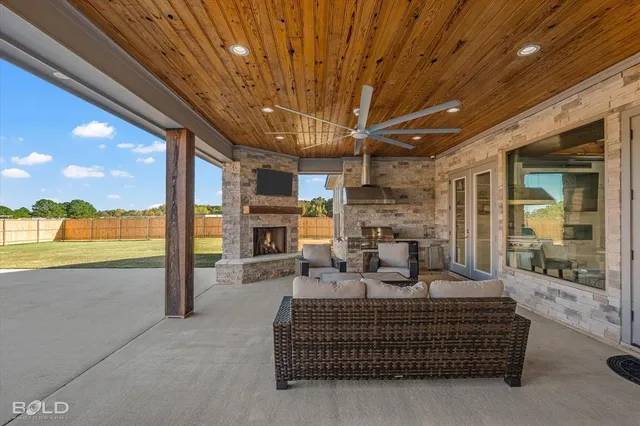 a view of a house with outdoor seating