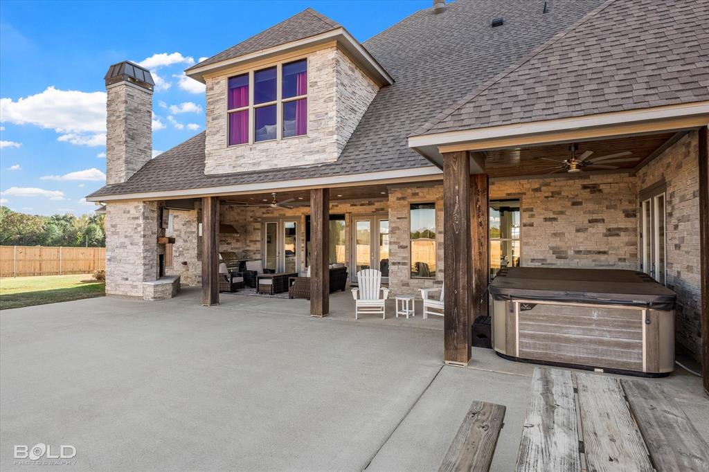 9480 McCain Road Shreveport, LA 71107 - Photo 33 of 40 a view of a house with outdoor seating