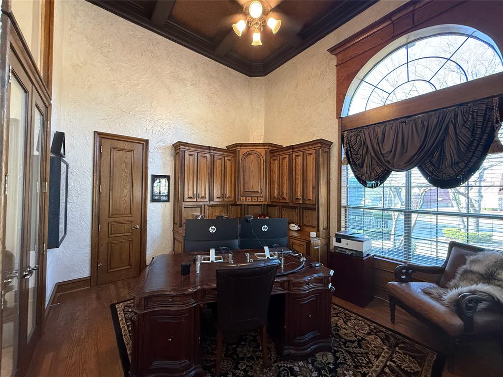1919 Kings Pass Heath, TX 75032 - Photo 16 of 38 Office with a textured wall, coffered ceiling, dark wood-style floors, and ornamental molding