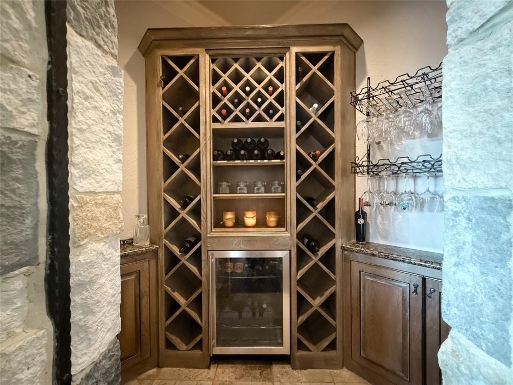 1919 Kings Pass Heath, TX 75032 - Photo 23 of 38 Wine cellar featuring beverage cooler