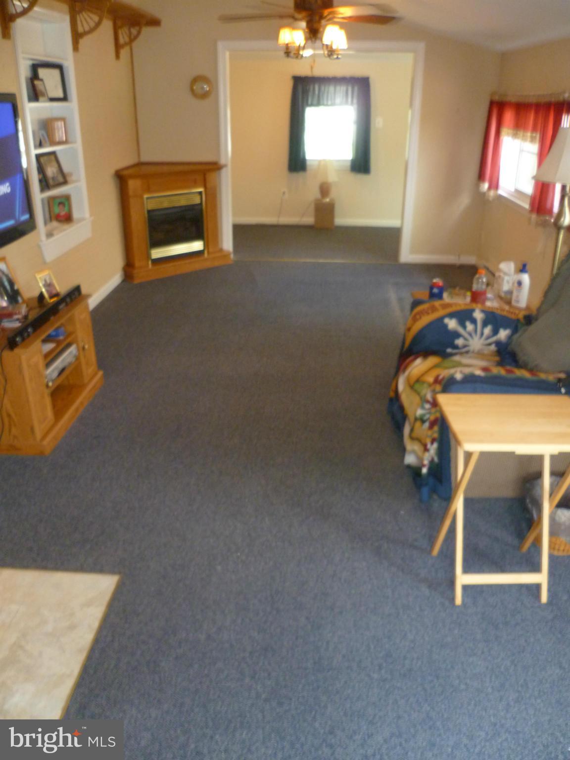 2305 Harford Road Fallston, MD 21047 - Photo 13 of 30 a living room with furniture and a fireplace