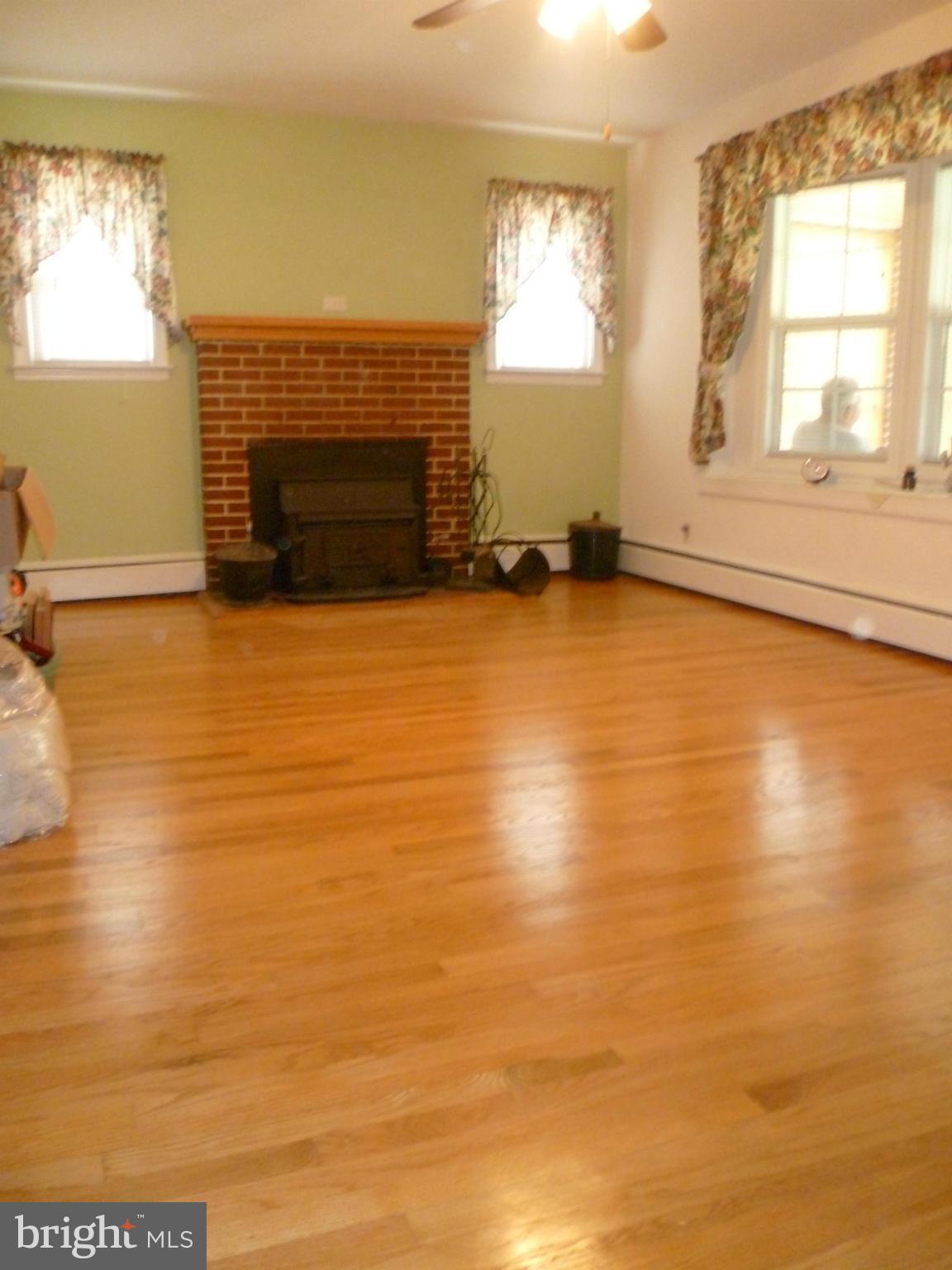 2305 Harford Road Fallston, MD 21047 - Photo 15 of 30 a view of empty room with window and fireplace