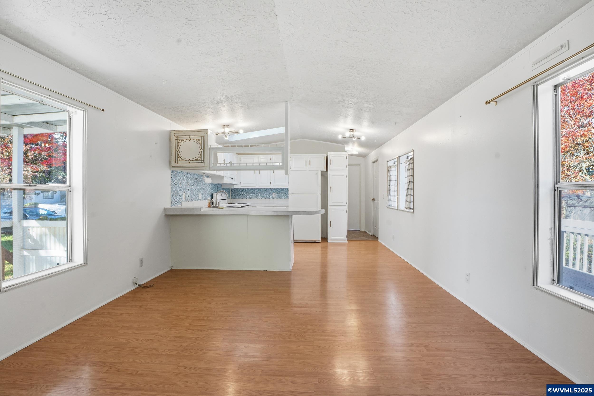 277 Edwards Road, Unit 145 Monmouth, OR 97361 - Photo 5 of 47 a view of kitchen and windows