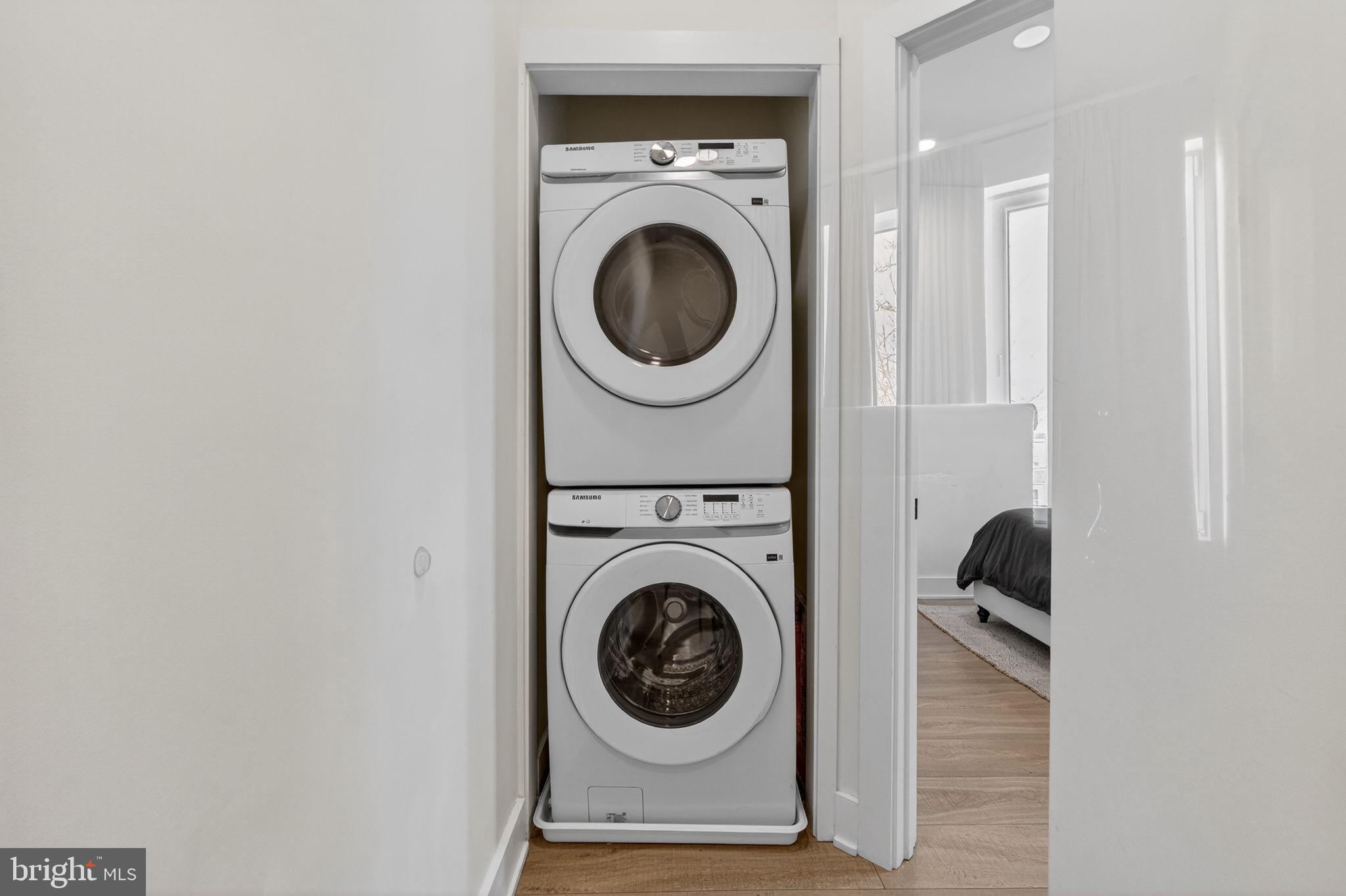 1307 Longfellow Street Northwest, Unit 8 Washington, DC 20011 - Photo 11 of 26 a view of entryway with washer and dryer