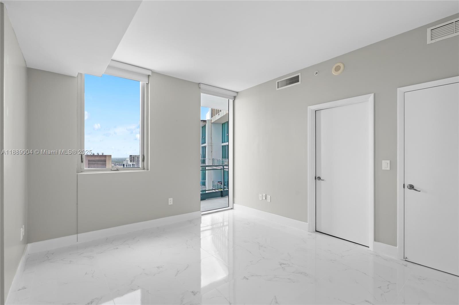 92 Southwest 3rd Street, Unit 5206 Miami, FL 33130 - Photo 11 of 21 a view of an empty room with a window