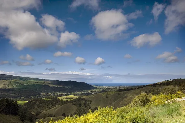 a view of lake and mountain