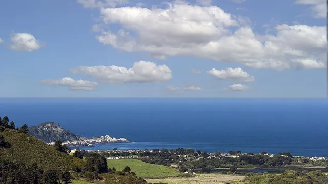a view of lake and mountain