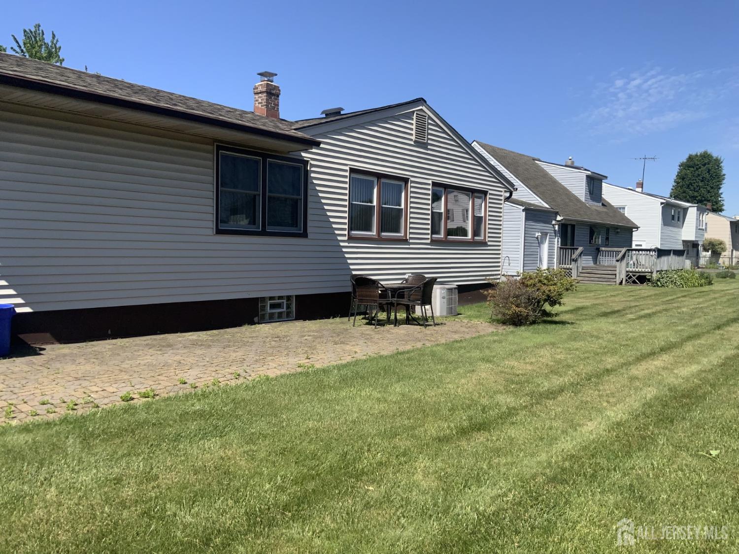 178 Willow Street Port Reading, NJ 07064 - Photo 15 of 15 a front view of a house with a yard
