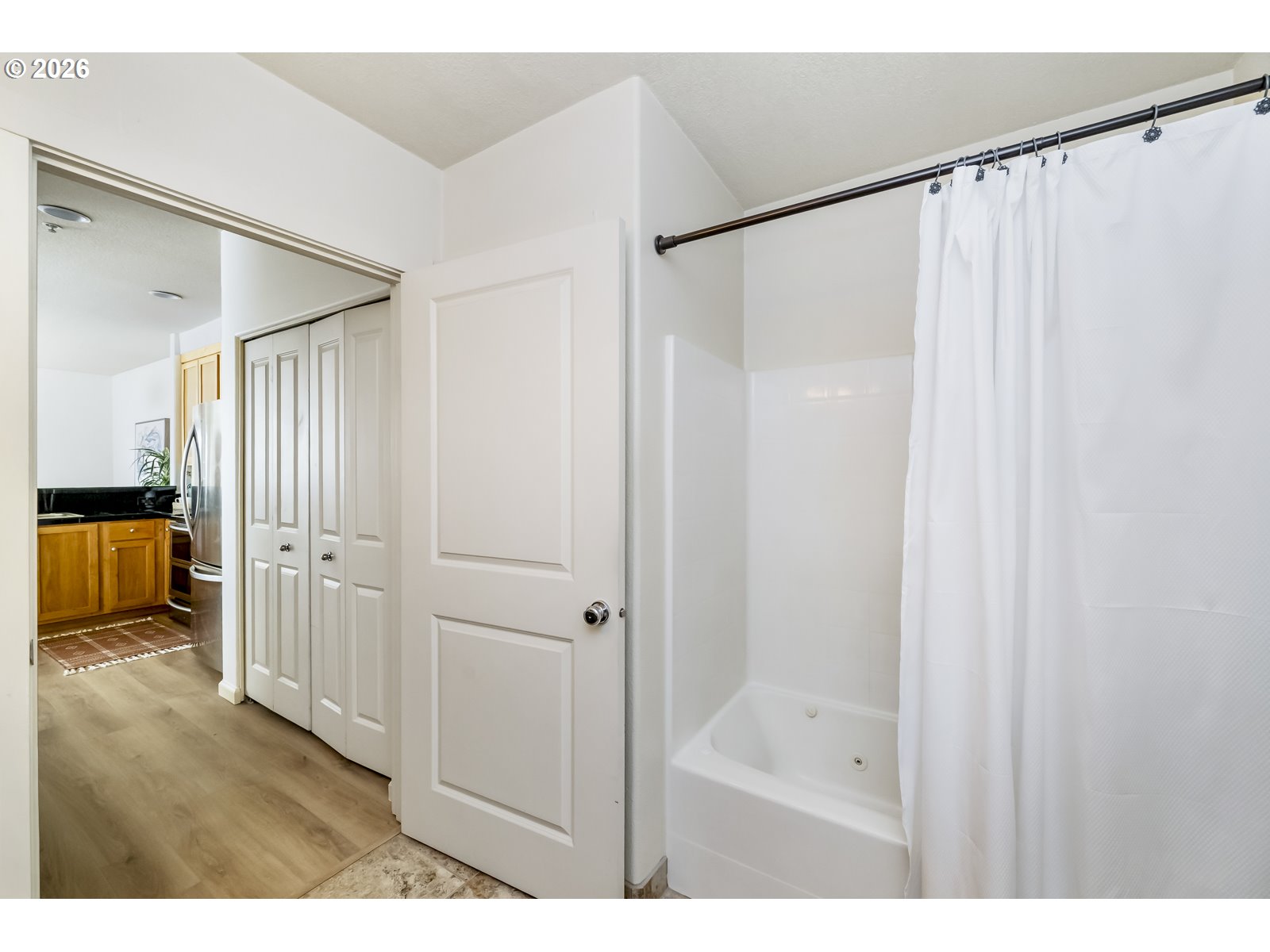 1100 Southwest 170th Avenue, Unit 100 Beaverton, OR 97003 - Photo 13 of 17 a bathroom with a shower and a tub