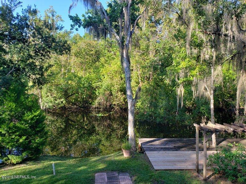 419 Marina Road Satsuma, FL 32189 - Photo 8 of 18 a view of backyard with green space