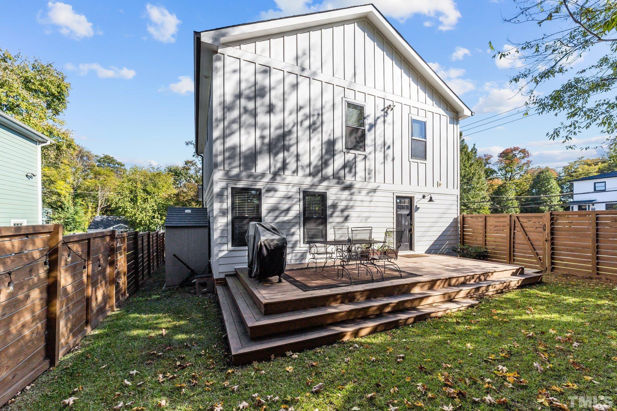 514 Freeman Street Raleigh, NC 27601 - Photo 22 of 27 a view of backyard with a deck