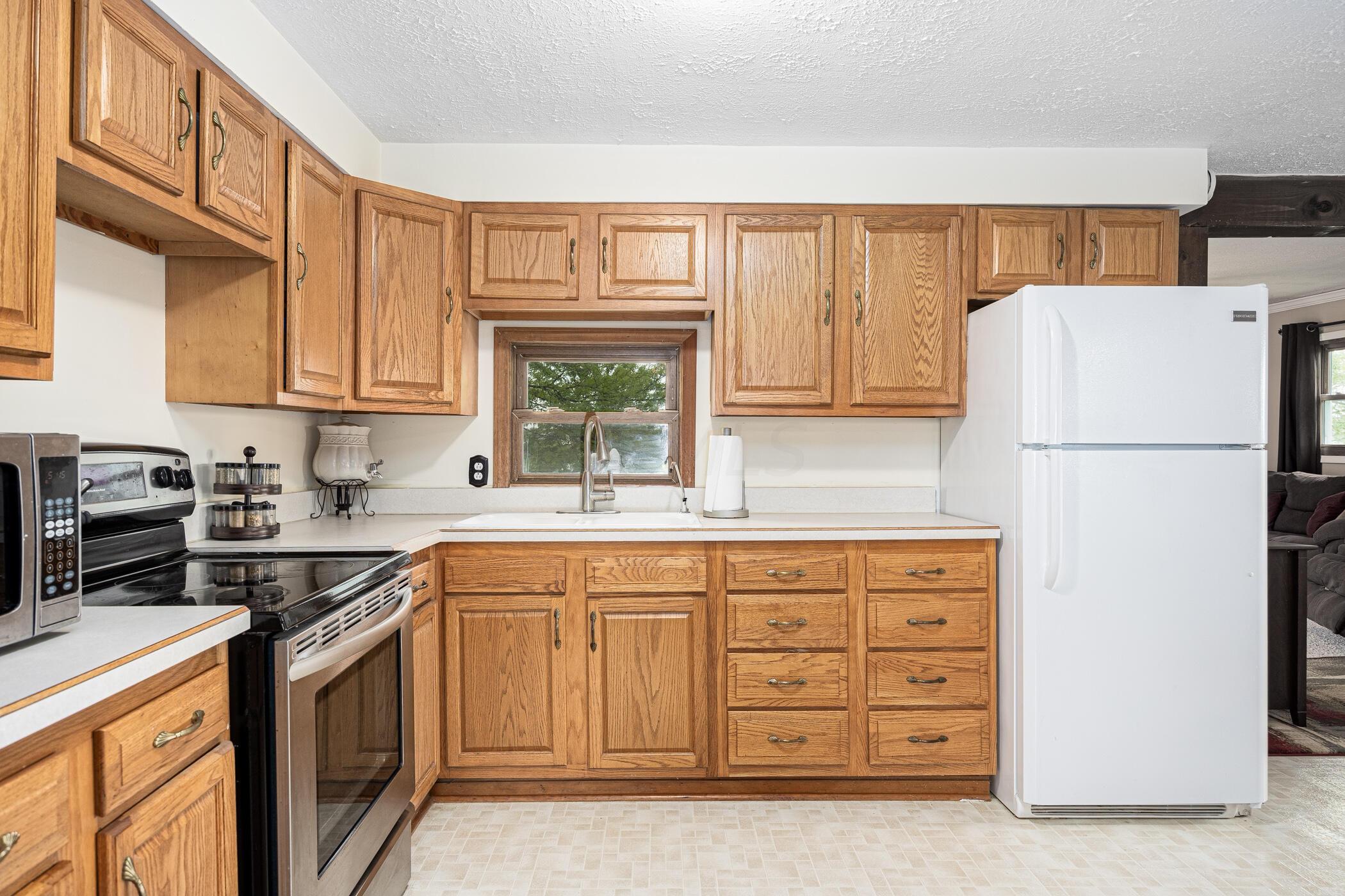 12913 Fladt Road Marysville, OH 43040 - Photo 22 of 73 Kitchen w/window over sink to backyard