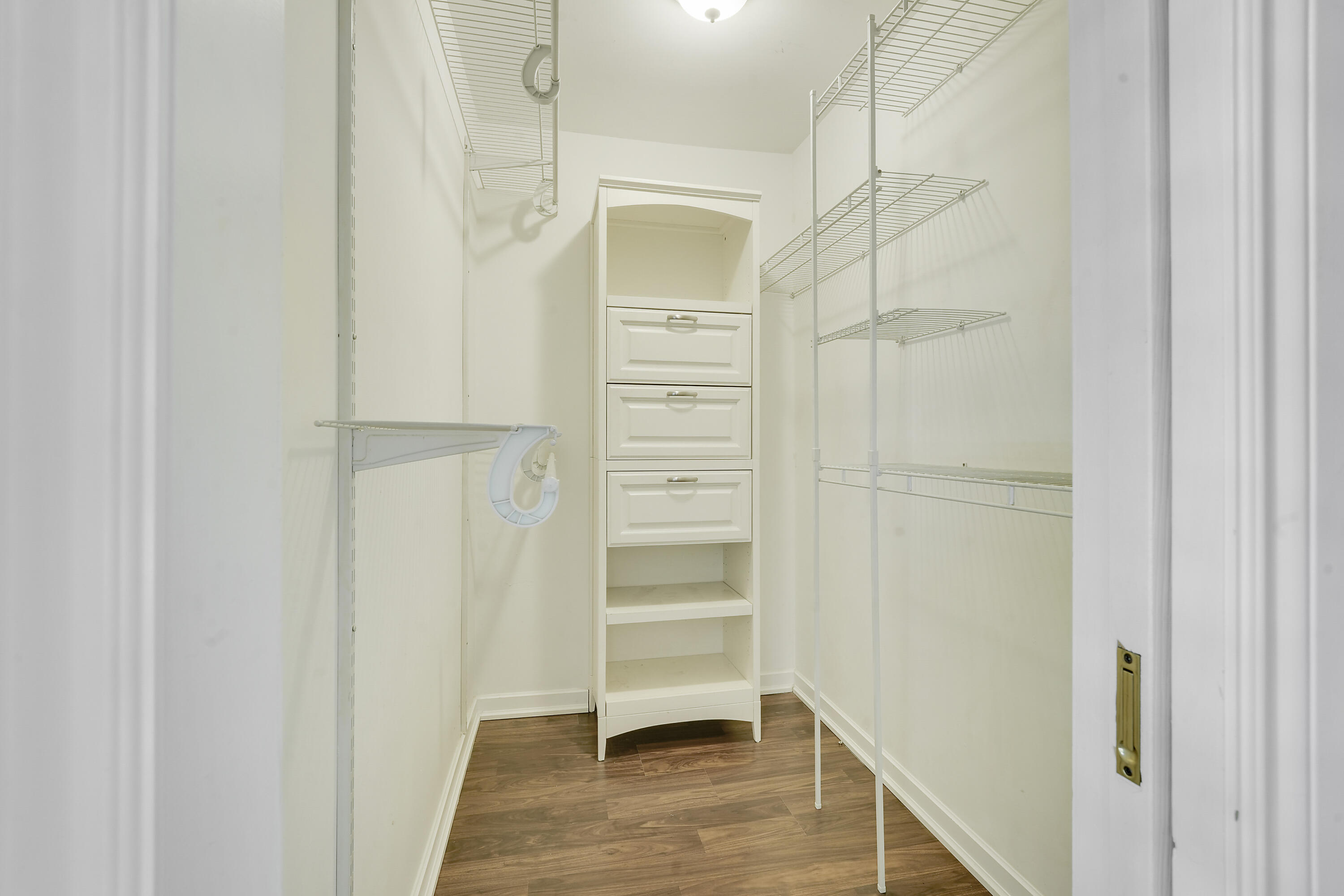 150 Pineview Road, Unit K4 Jupiter, FL 33469 - Photo 12 of 14 150 Pineview primary closet