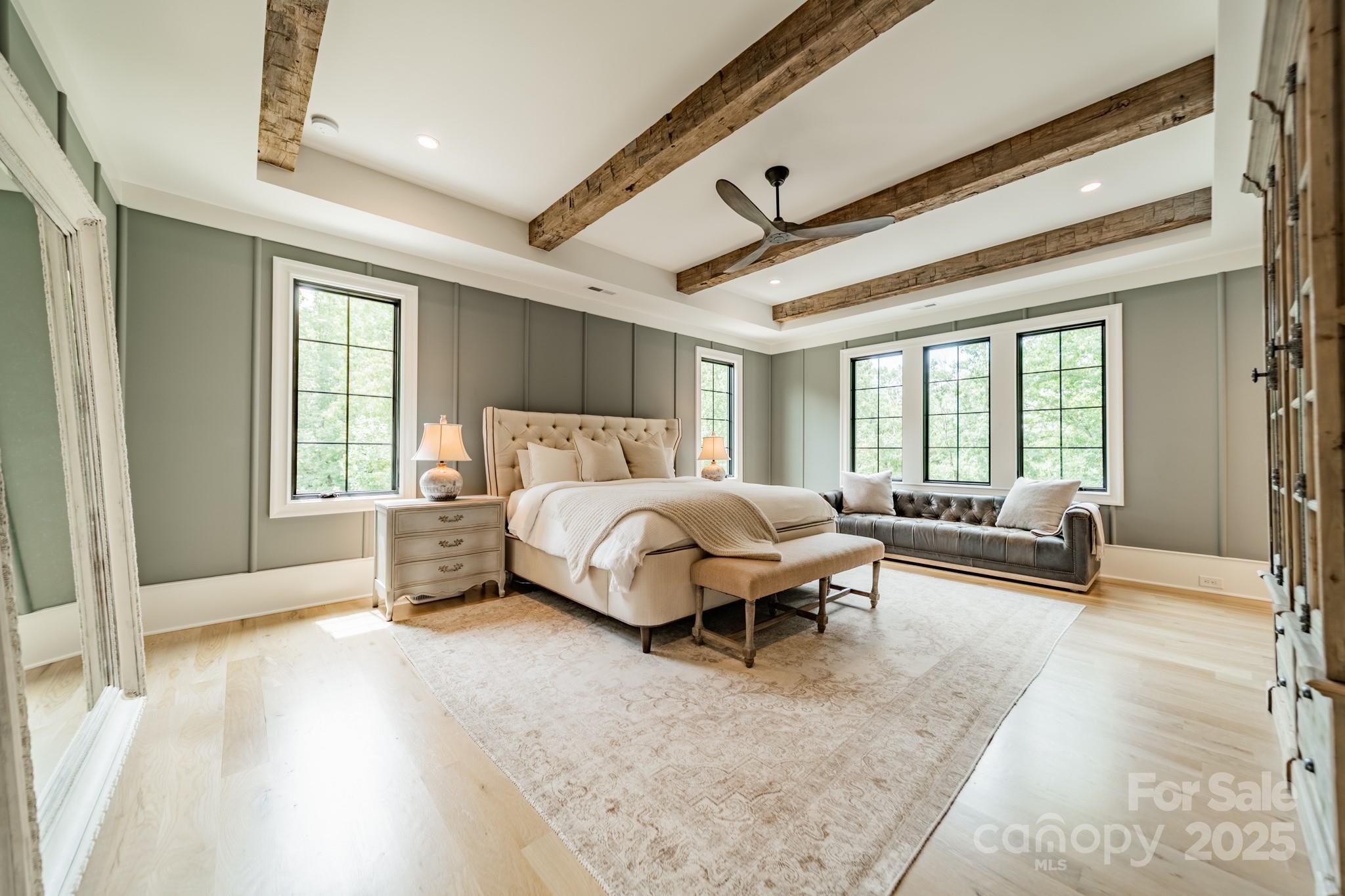 430 Bramble Way Fort Mill, SC 29708 - Photo 14 of 45 a bedroom with a bed wooden floor and couch