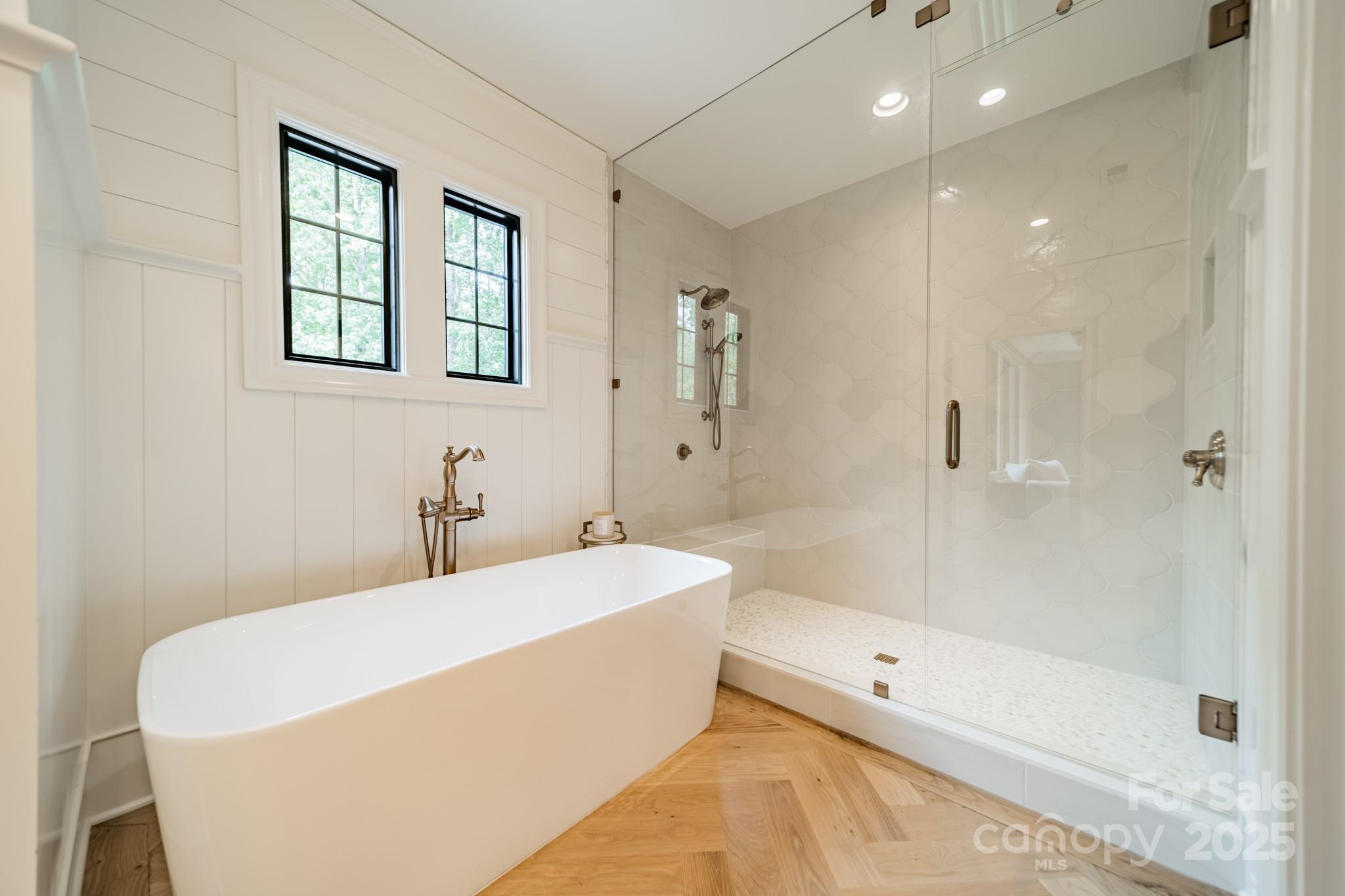 430 Bramble Way Fort Mill, SC 29708 - Photo 17 of 45 a bathroom with a tub a sink and a shower