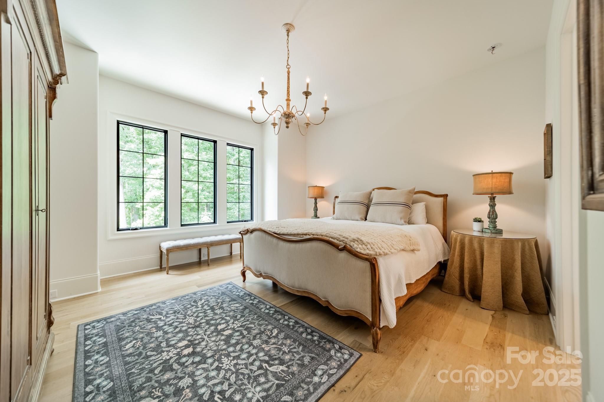 430 Bramble Way Fort Mill, SC 29708 - Photo 21 of 45 a bedroom with a bed lamps and a dresser