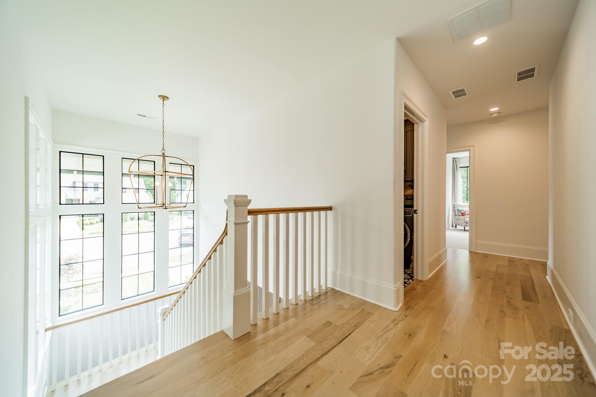 430 Bramble Way Fort Mill, SC 29708 - Photo 26 of 45 a view of a room with wooden floor and windows
