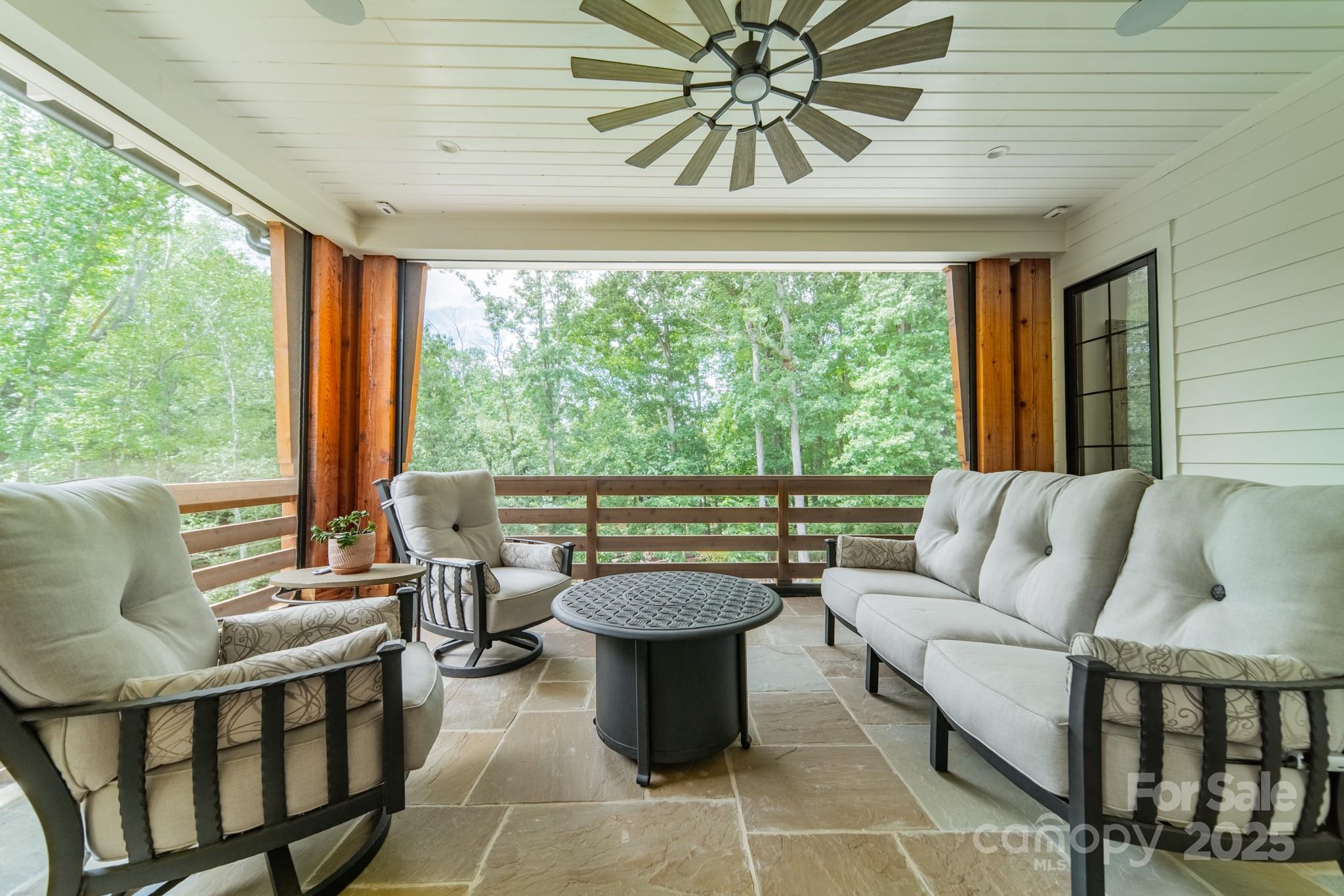430 Bramble Way Fort Mill, SC 29708 - Photo 33 of 45 a living room with furniture a large window and a table