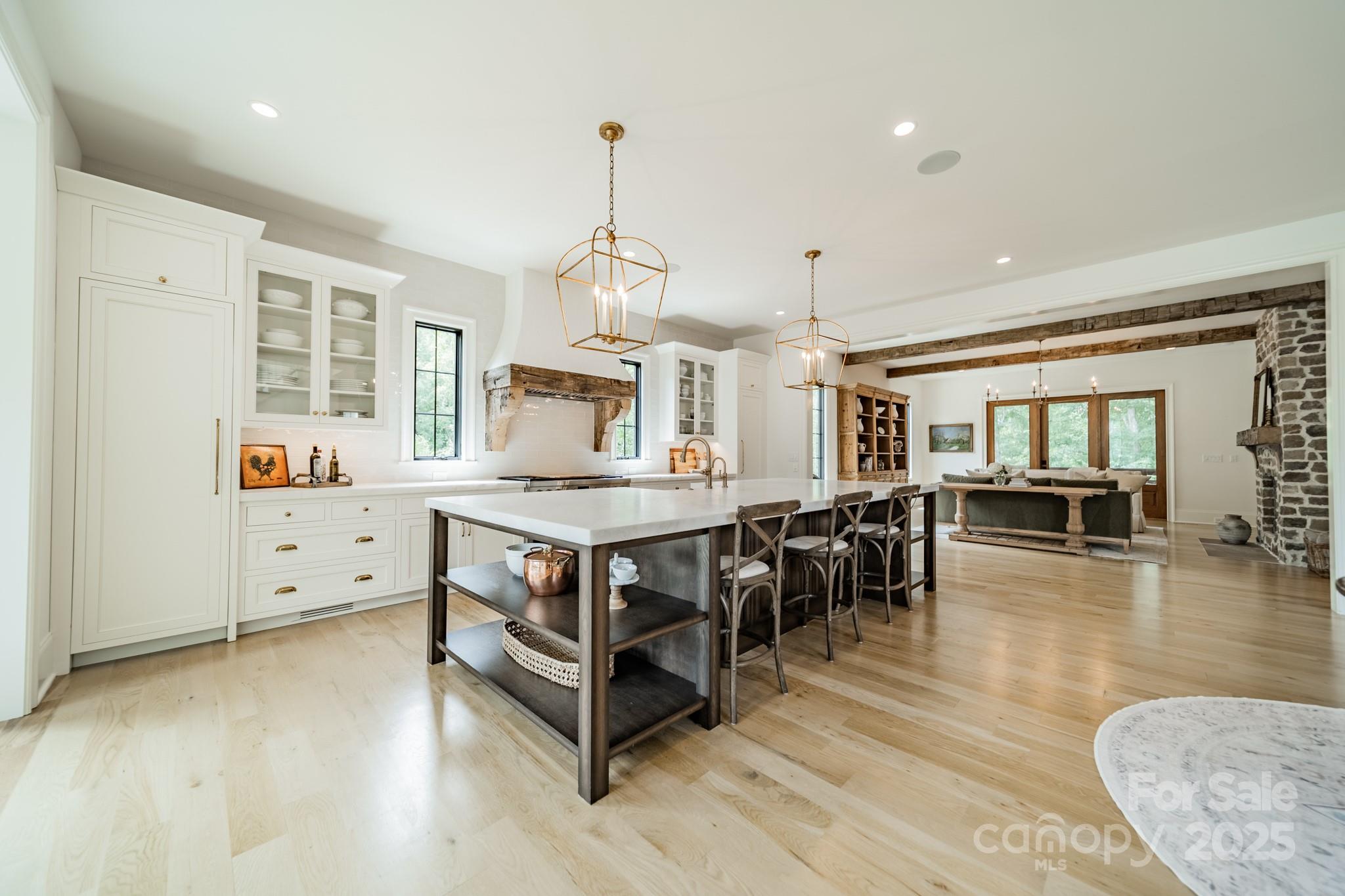 430 Bramble Way Fort Mill, SC 29708 - Photo 4 of 45 a room with wooden floors and white walls