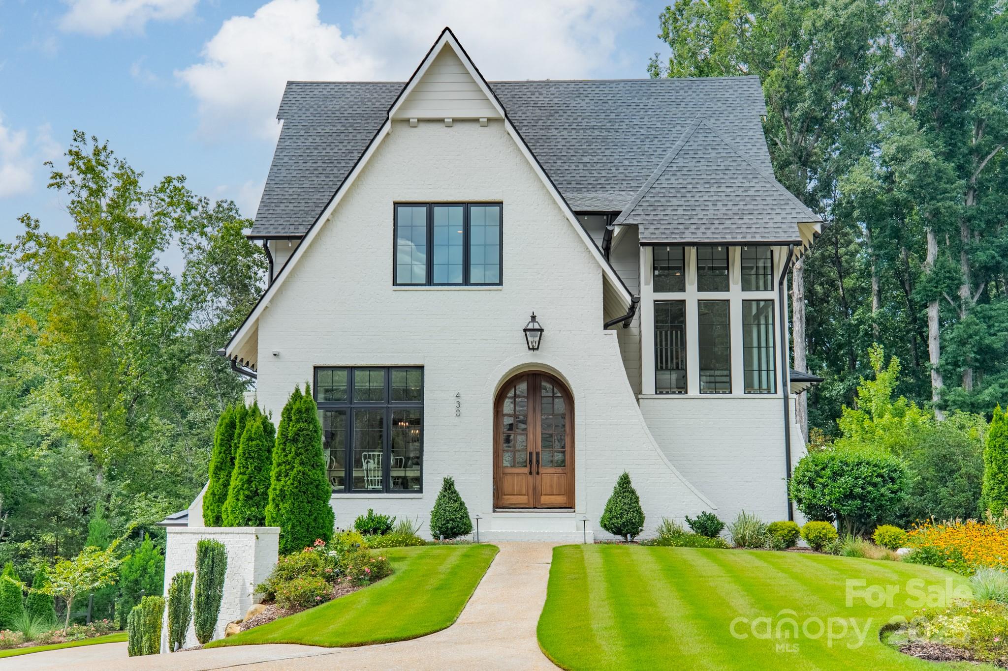 430 Bramble Way Fort Mill, SC 29708 - Photo 45 of 45 a view of house with garden and tall trees