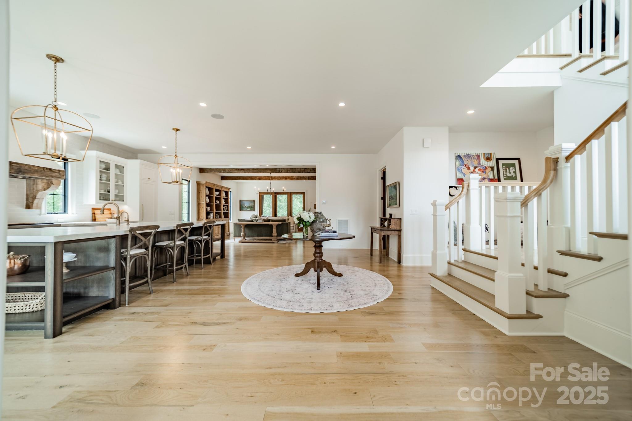 430 Bramble Way Fort Mill, SC 29708 - Photo 6 of 45 a living room with fireplace furniture and a dining table