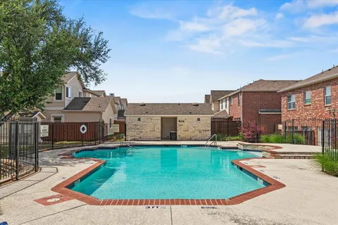 a view of a house with a yard porch and sitting area