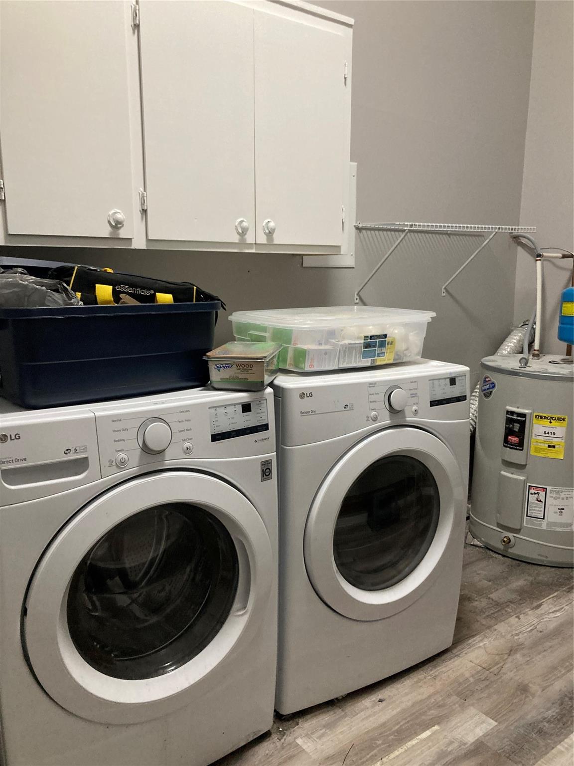 7530 Riding Trail Road Charlotte, NC 28212 - Photo 10 of 20 a utility room with dryer and washer