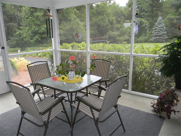27 Torrey Road Sutton, MA 01590 - Photo 24 of 30 a view of a chairs and table in the patio