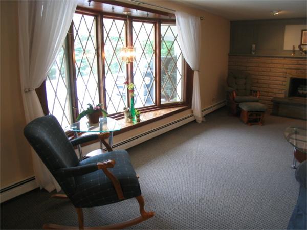 27 Torrey Road Sutton, MA 01590 - Photo 4 of 30 a room with gym equipment and a large window