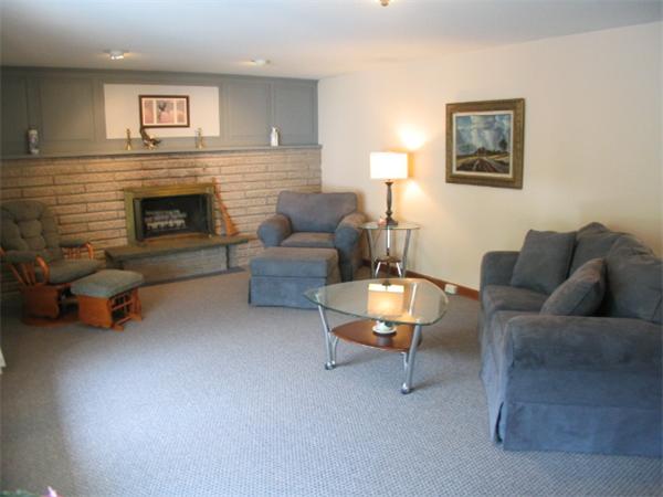 27 Torrey Road Sutton, MA 01590 - Photo 5 of 30 a living room with furniture and a fireplace
