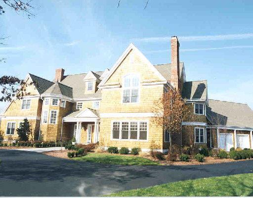 18 Spectacle Lane Ridgefield, CT 06877 - Photo 1 of 1 a front view of residential houses with yard and road