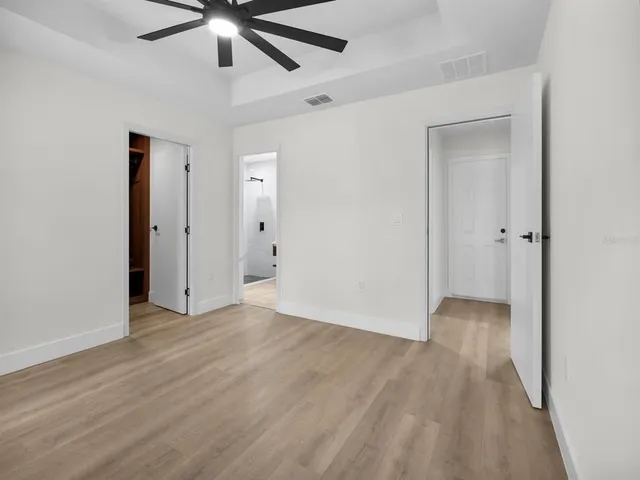 a bathroom with a sink a mirror and a shower