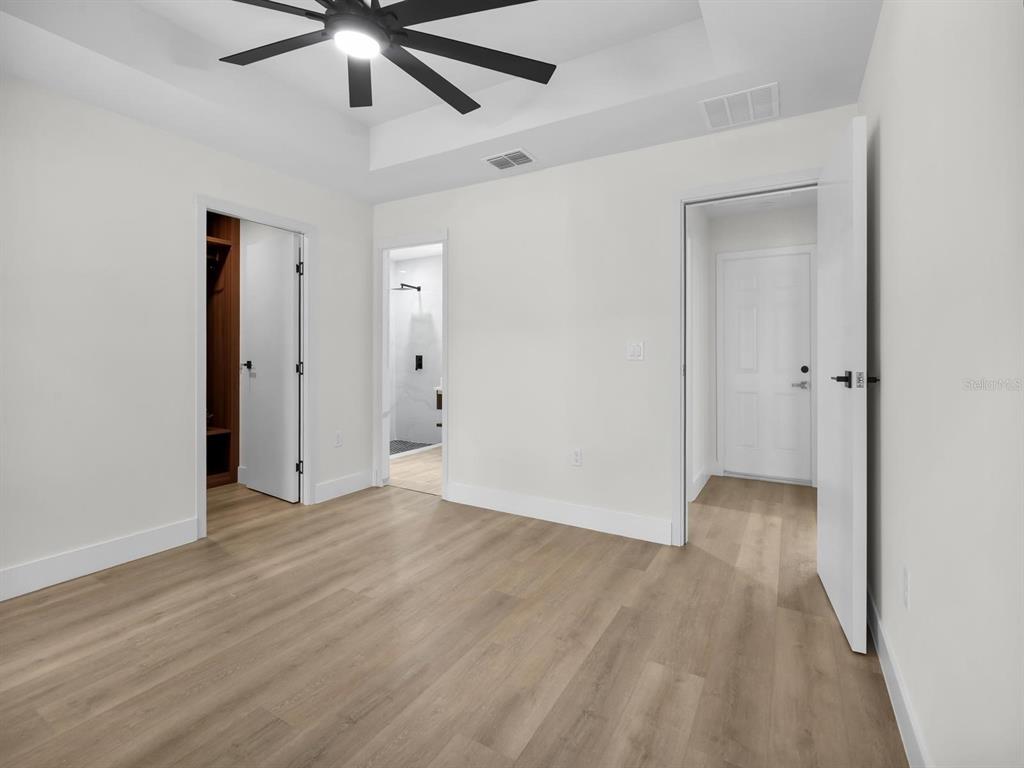 11790 Orange Road Ocklawaha, FL 32179 - Photo 13 of 21 a view of an empty room and wooden floor