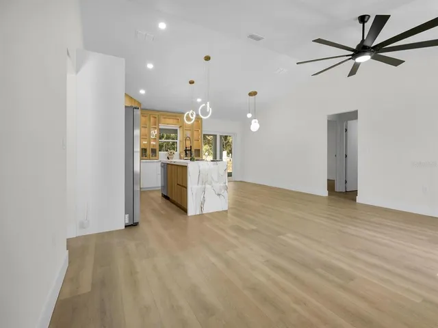 a bathroom with a double vanity sink and mirror