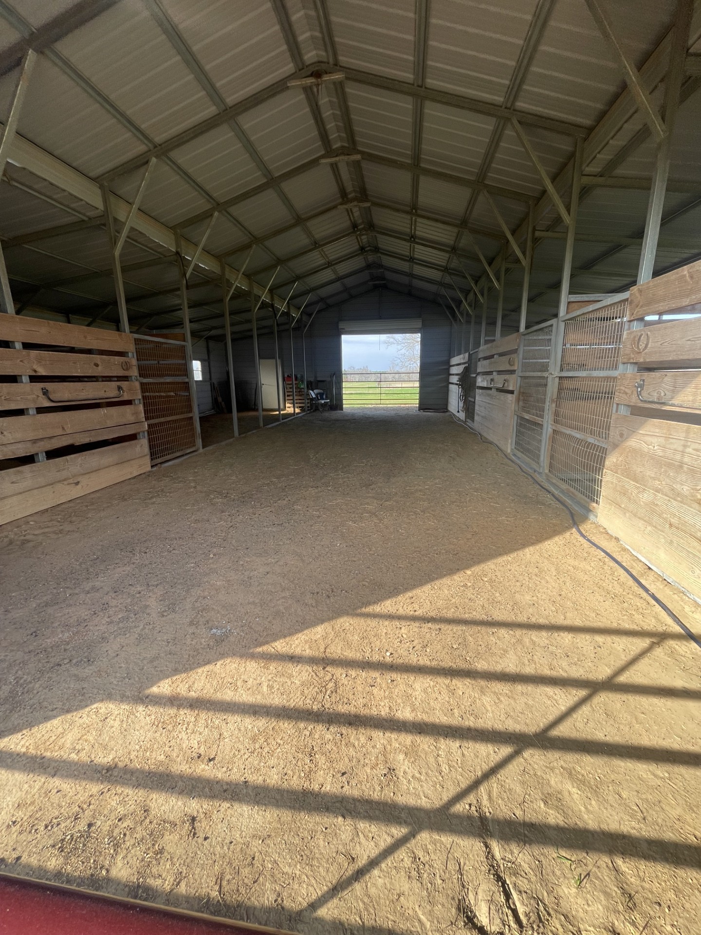 511 County Road 161 Long Branch, TX 75669 - Photo 11 of 32 a view of a room with wooden walls