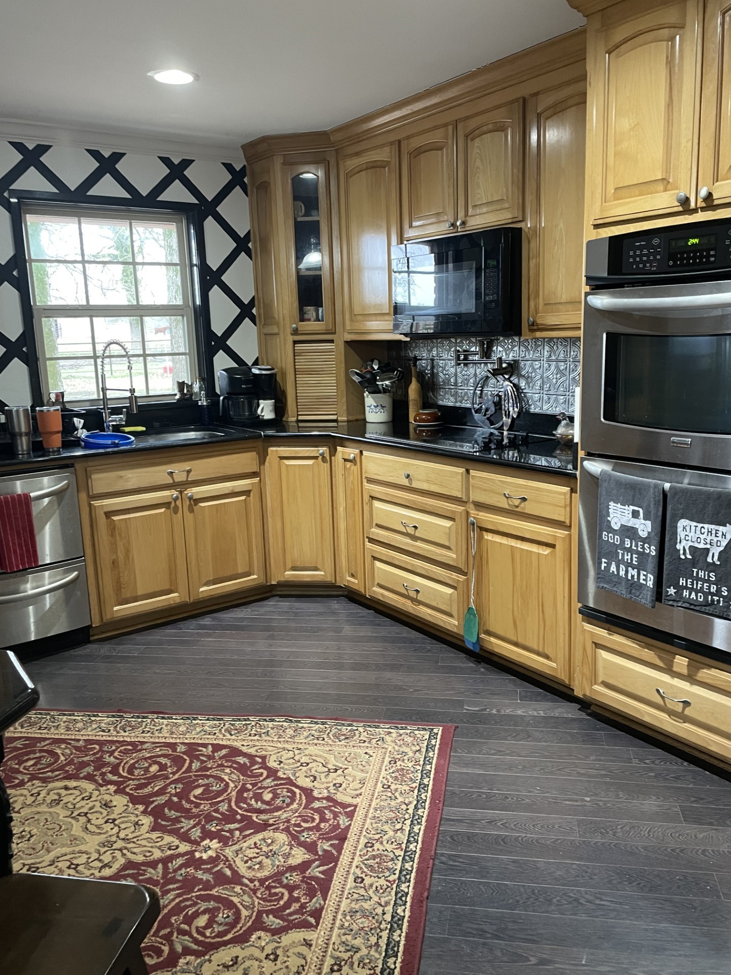 511 County Road 161 Long Branch, TX 75669 - Photo 13 of 32 a kitchen with stainless steel appliances granite countertop a stove a sink and a microwave