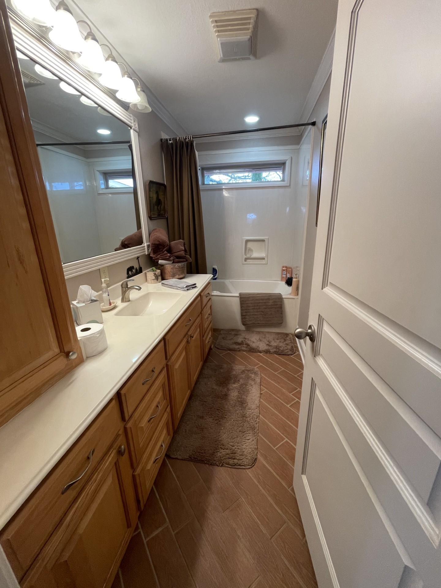 511 County Road 161 Long Branch, TX 75669 - Photo 20 of 32 a bathroom with a double vanity sink mirror and toilet