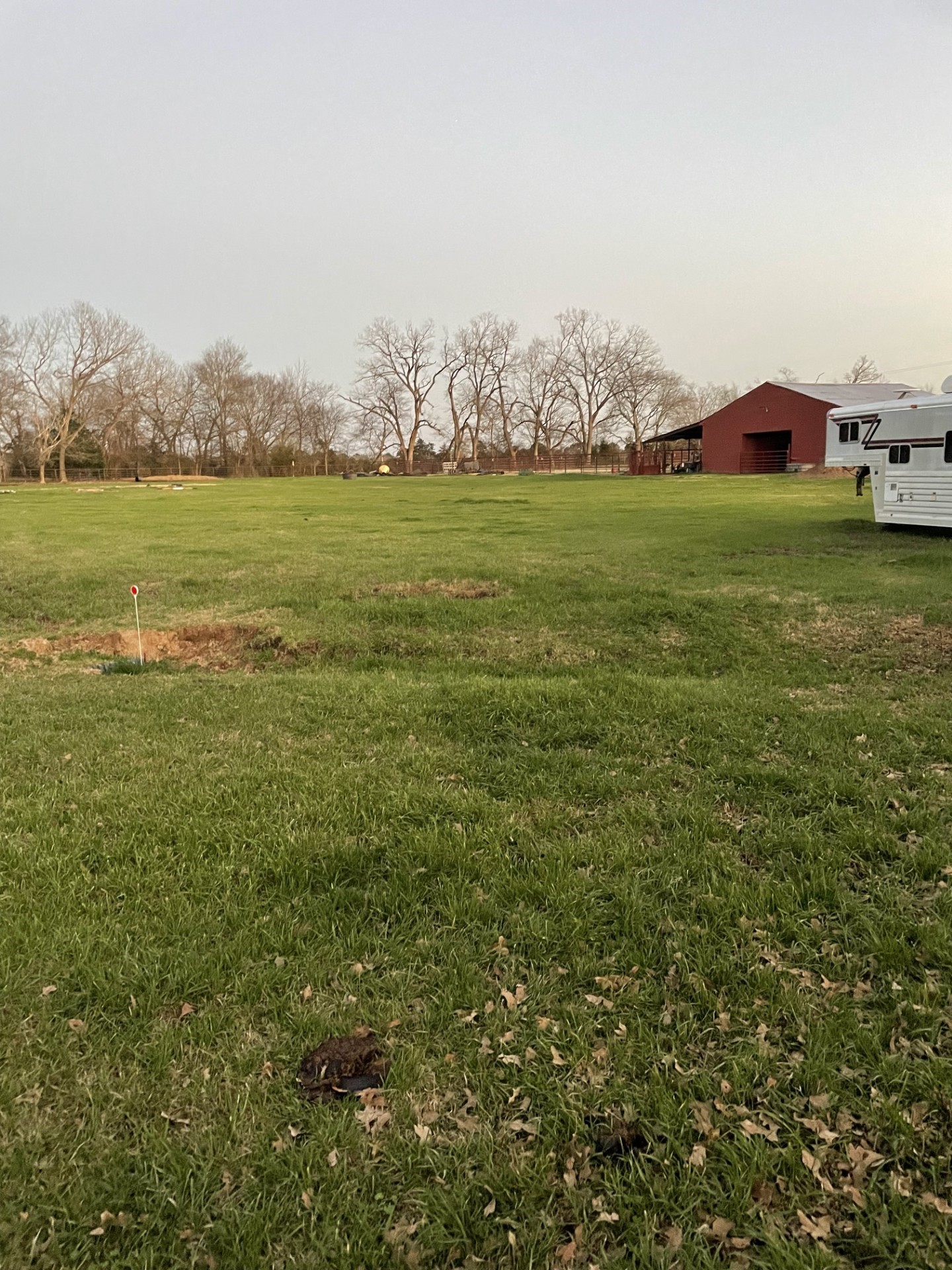 511 County Road 161 Long Branch, TX 75669 - Photo 8 of 32 a view of an ocean with houses in the background