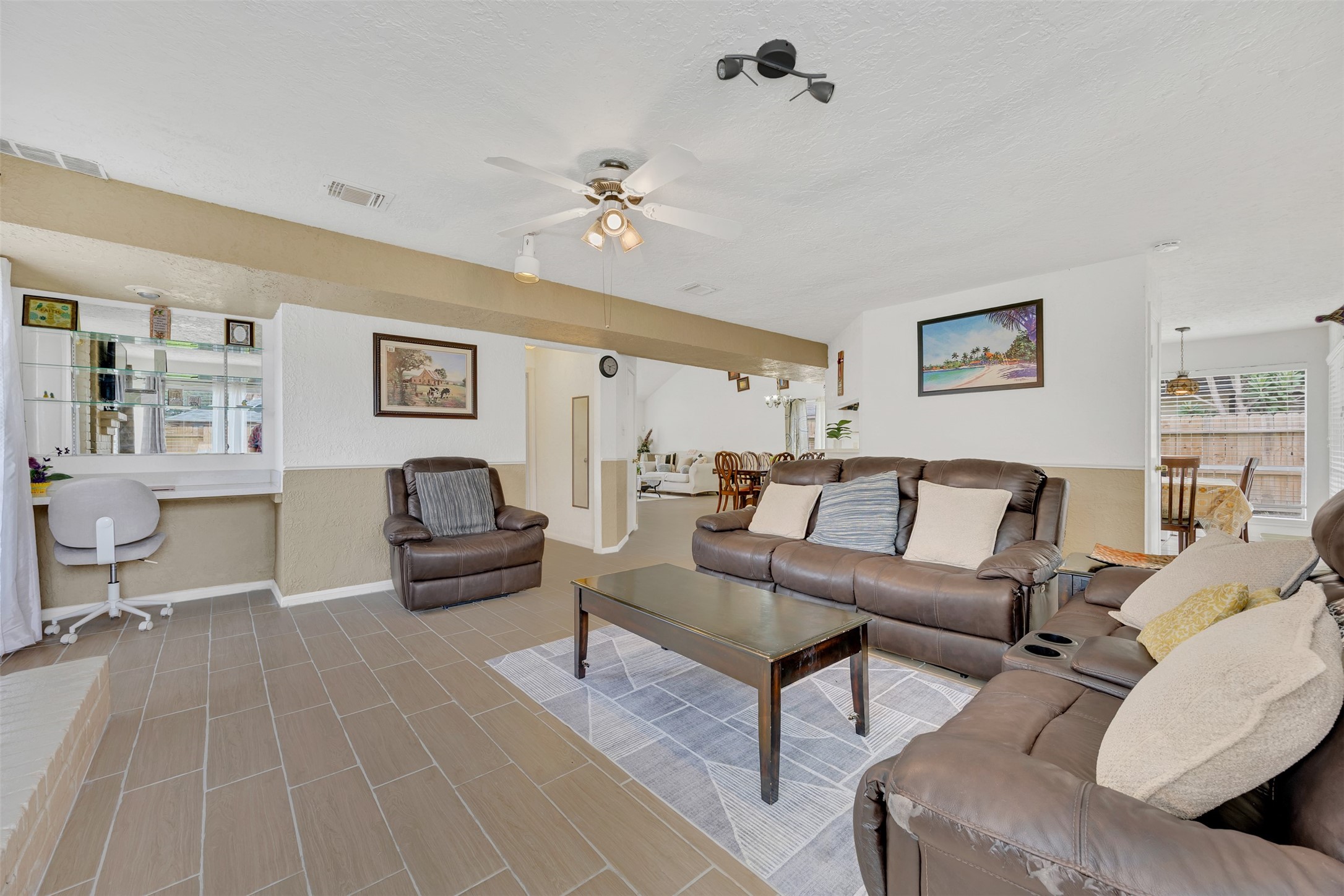 15619 Beechnut Street Houston, TX 77083 - Photo 10 of 29 Versatile living space that can serve as a media room, play area, or home office.