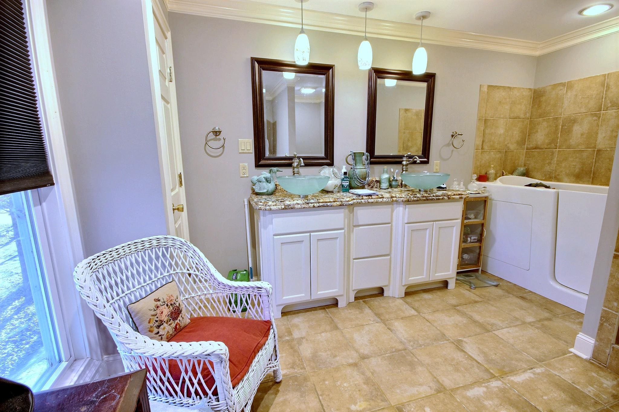 25 Dunhill Court Counce, TN 38326 - Photo 18 of 38 Bathroom featuring crown molding, custom double vanity