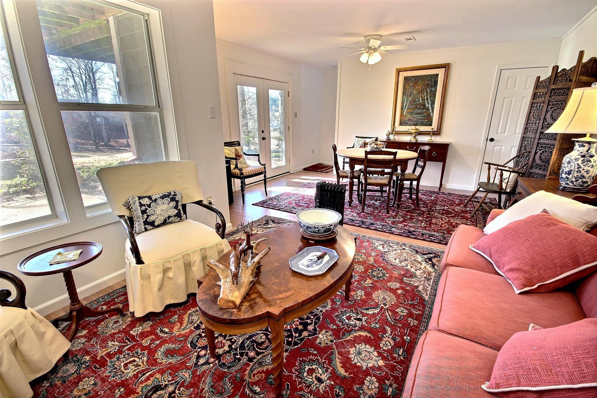 25 Dunhill Court Counce, TN 38326 - Photo 21 of 38 Living area with french doors, ceiling fan, and wood finished floors