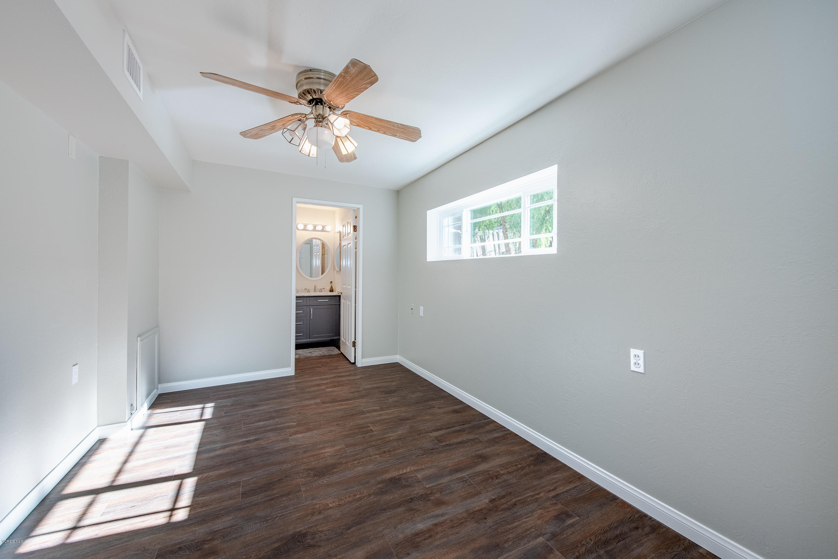 823 Katherine Road Simi Valley, CA 93063 - Photo 12 of 25 a view of an empty room with a window