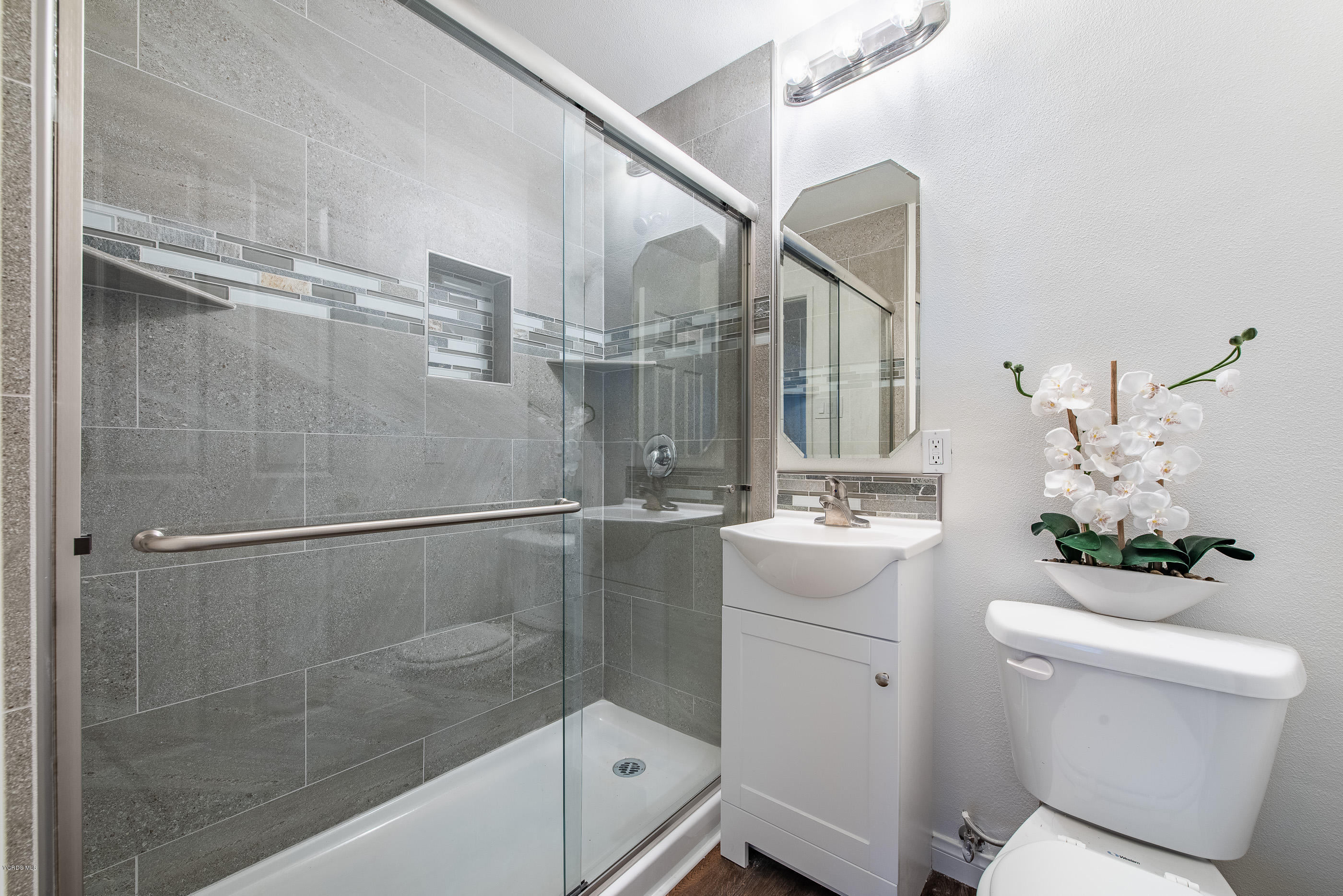 823 Katherine Road Simi Valley, CA 93063 - Photo 13 of 25 a bathroom with a sink a toilet and shower
