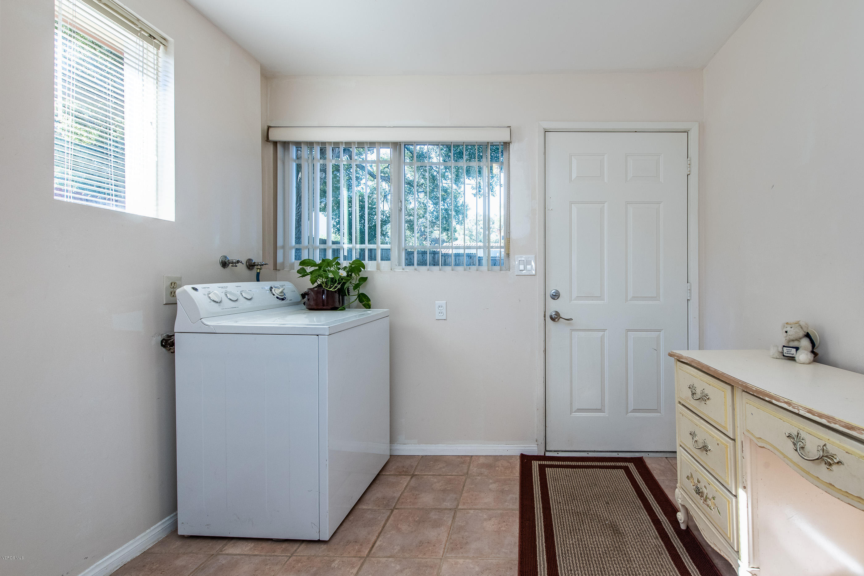 823 Katherine Road Simi Valley, CA 93063 - Photo 14 of 25 a bathroom with a sink toilet and window