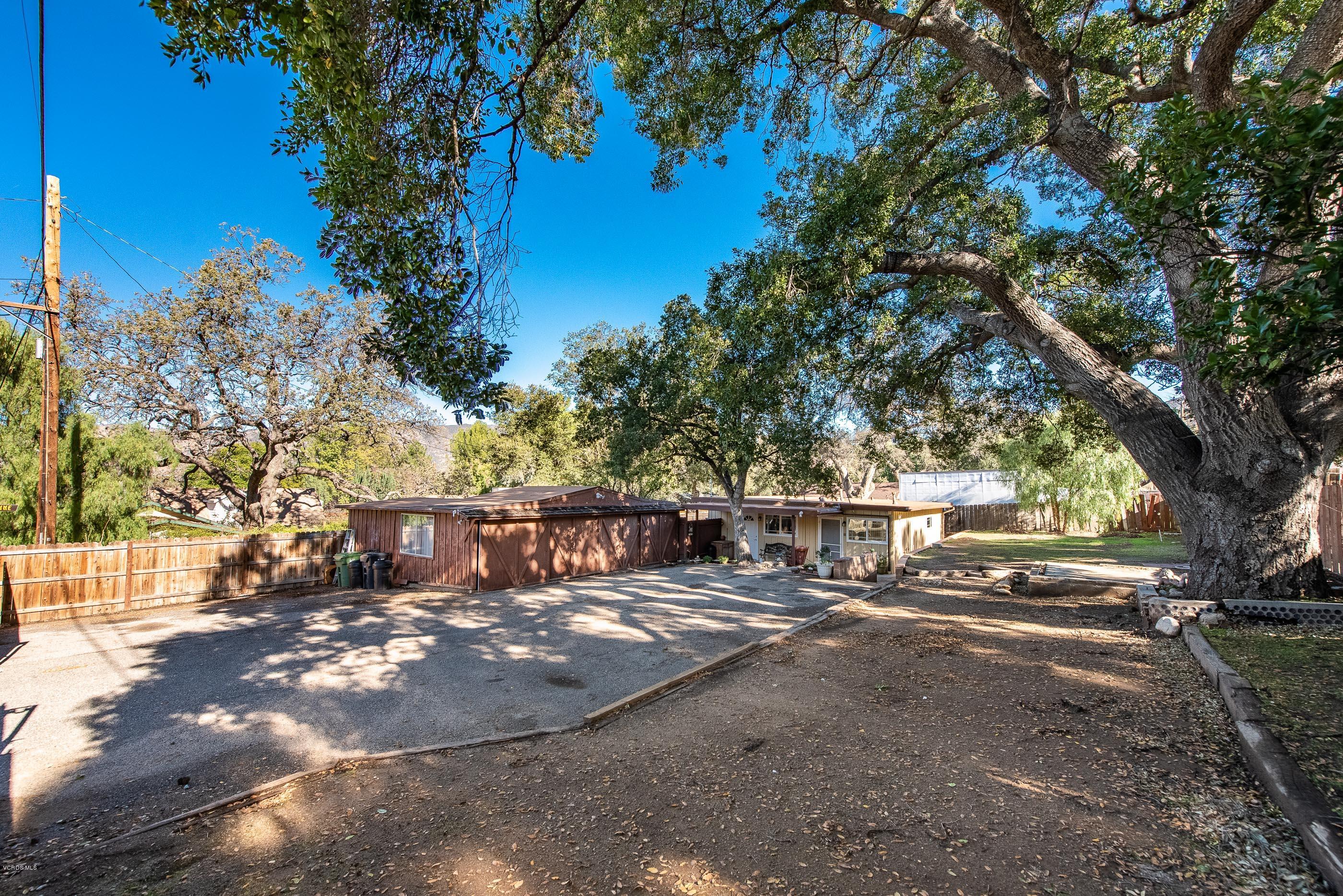 823 Katherine Road Simi Valley, CA 93063 - Photo 18 of 25 a view of a park with bench and trees
