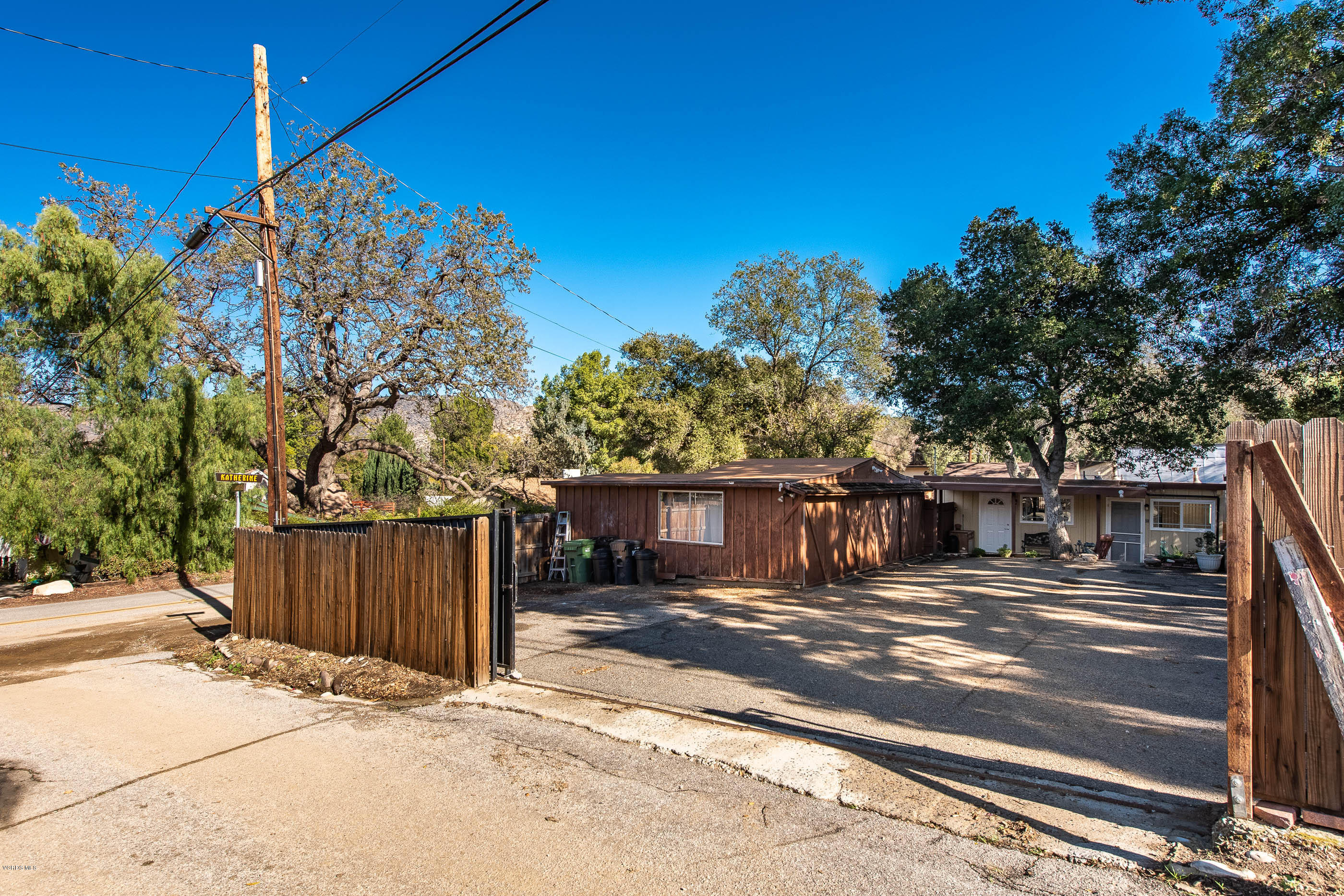823 Katherine Road Simi Valley, CA 93063 - Photo 23 of 25 a view of a house with wooden fence