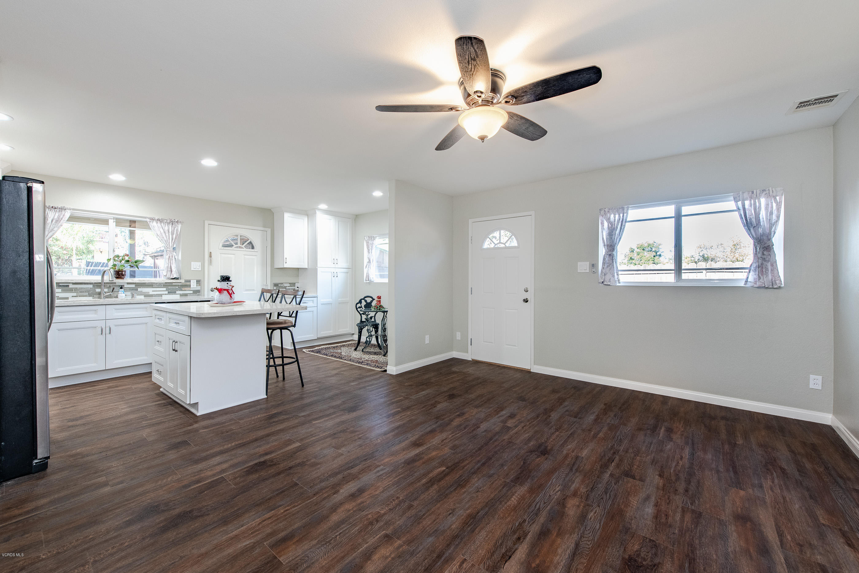 823 Katherine Road Simi Valley, CA 93063 - Photo 4 of 25 a view of a kitchen with wooden floor and a window