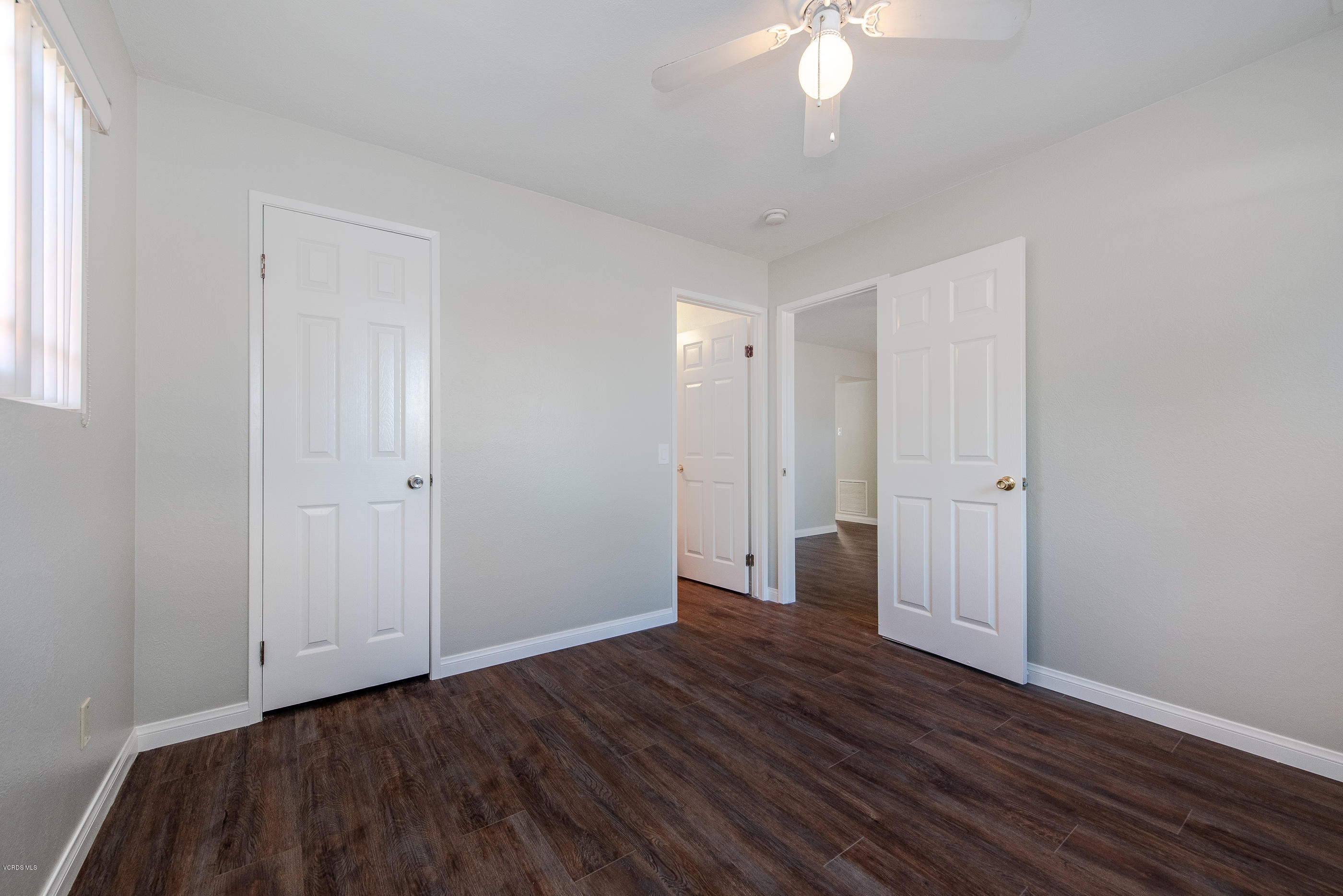 823 Katherine Road Simi Valley, CA 93063 - Photo 10 of 25 a view of an empty room with wooden floor