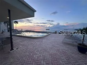 a view of a terrace with wooden walls