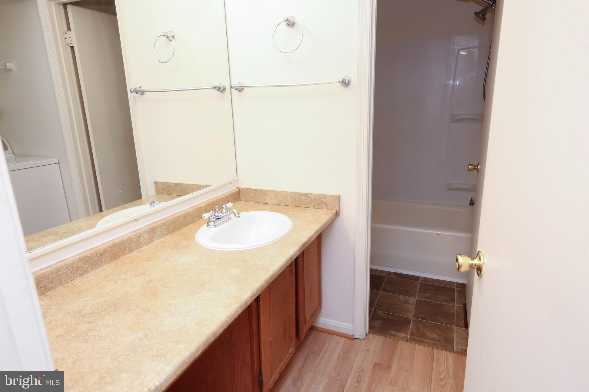 1243 Independence Square Belcamp, MD 21017 - Photo 13 of 19 a bathroom with a sink and a mirror